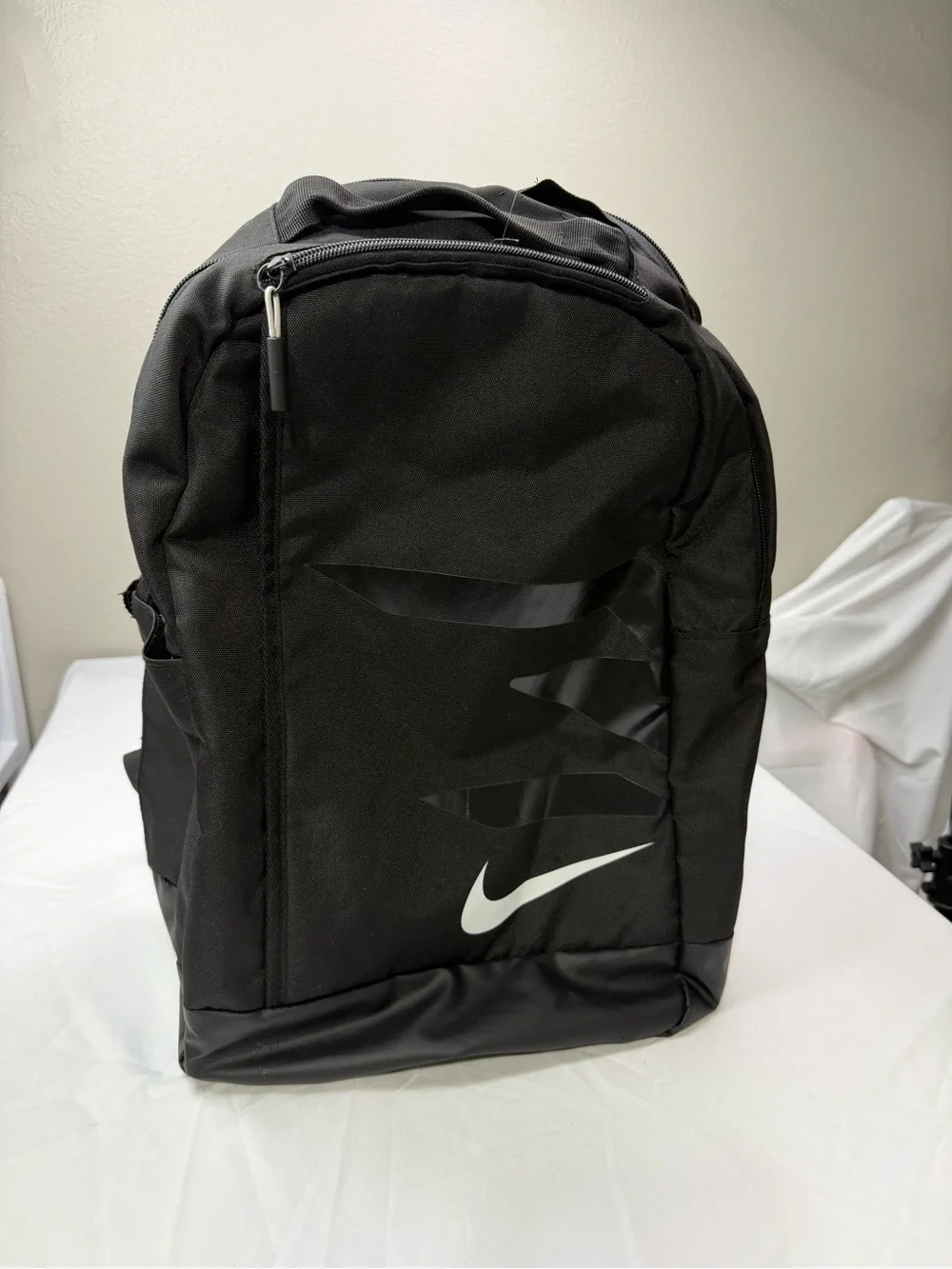 Nike Black Backpack with White Swoosh Accent